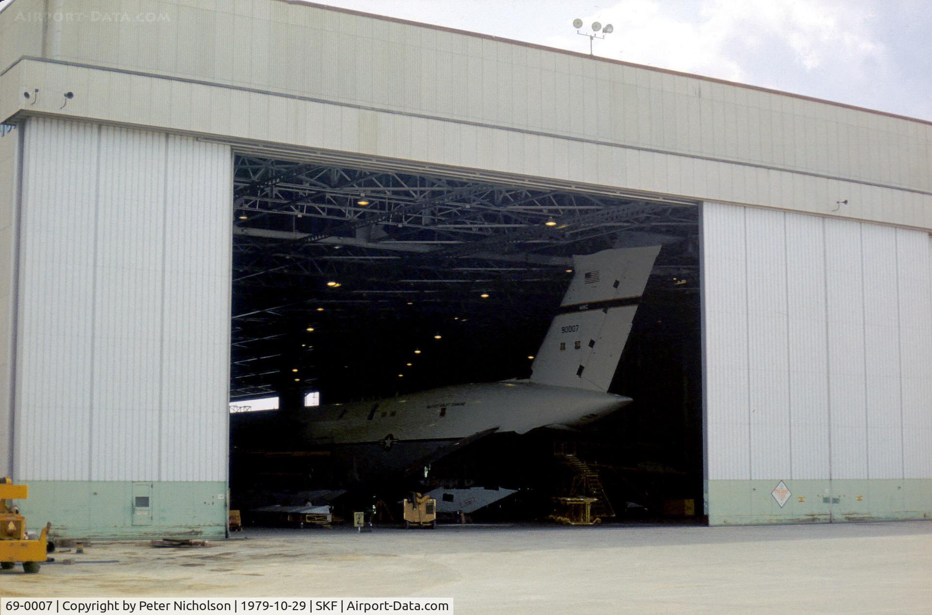 69-0007, 1969 Lockheed C-5A Galaxy C/N 500-0038, C-5A Galaxy of 60th Military Airlift Wing at Travis AFB undergoing maintenance at Kelly AFB in October 1979 and still in active service 32 years later.