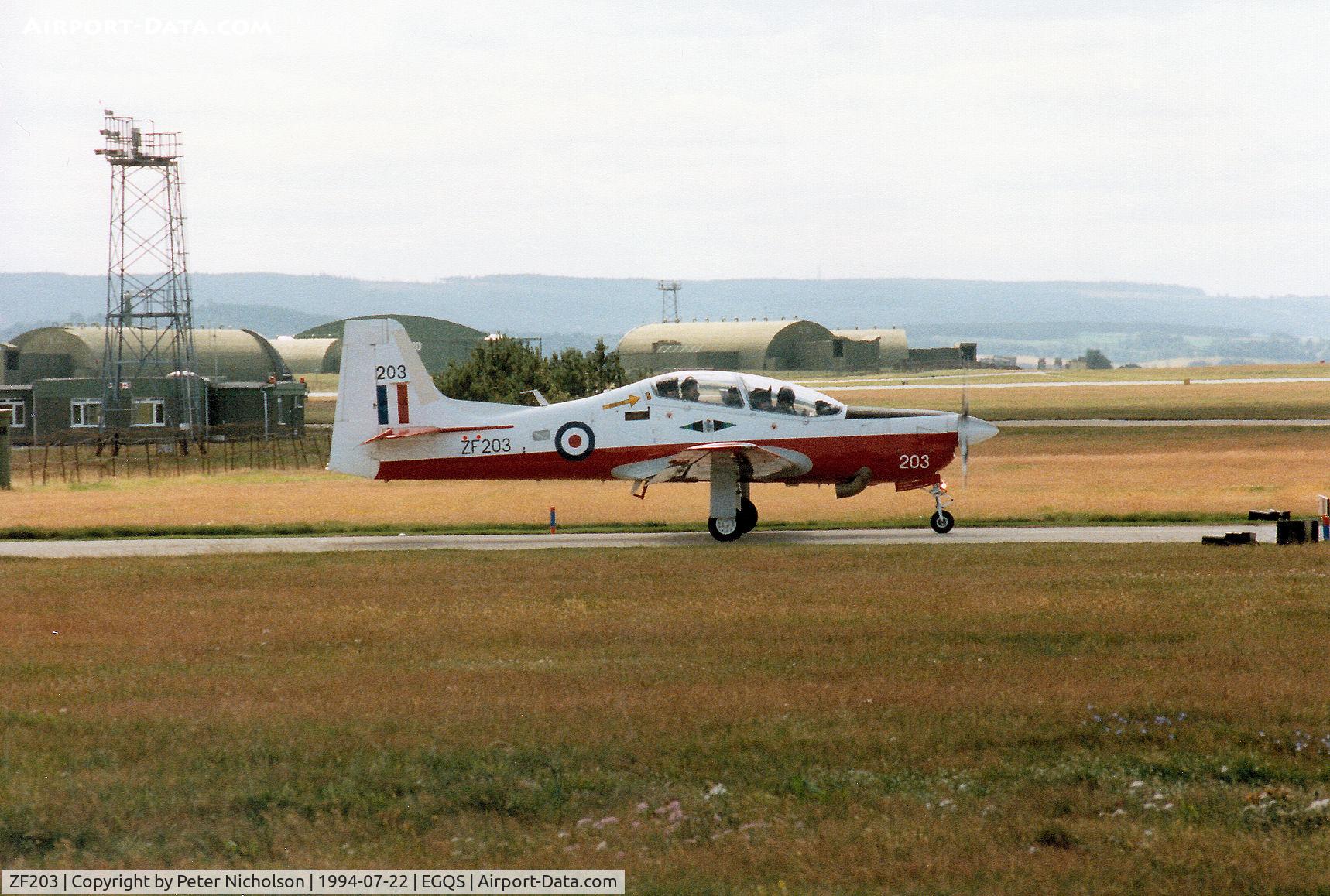 ZF203, 1989 Short S-312 Tucano T1 C/N S028/T28, Tucano T.1 of 1 Flying Training School at RAF Linton-on-Ouse preparing to join the active runway at RAF Lossiemouth in the Summer of 1994.