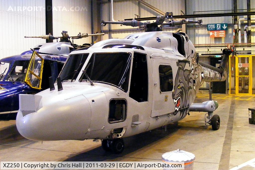XZ250, 1978 Westland Lynx HAS.3S C/N 084, former Royal Navy 'Wildcat' display team Lynx inside Hangar 6. Rumoured to be going to the International Helicopter Museum, Weston-super-Mare