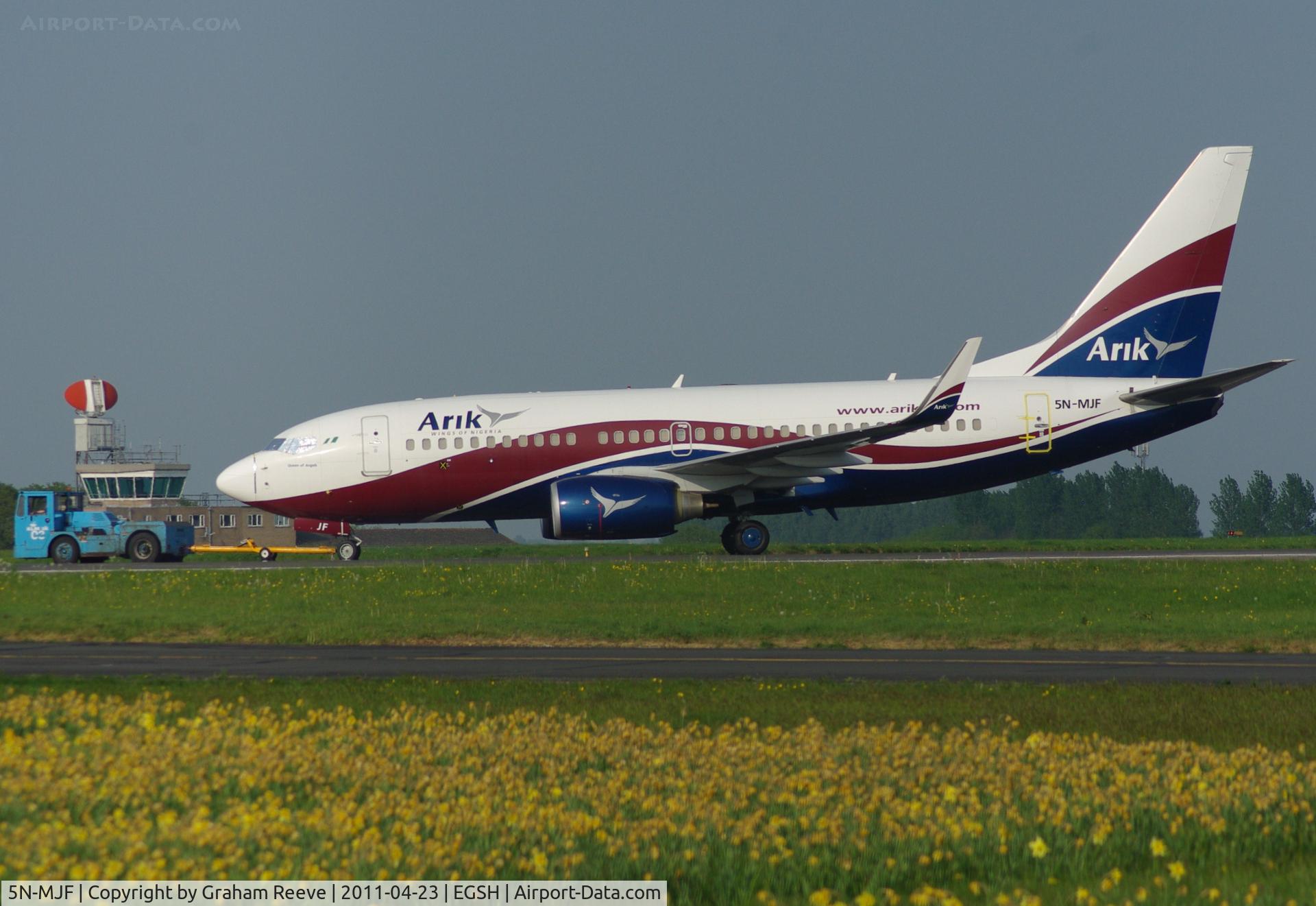 5N-MJF, Boeing 737-7GL C/N 34762/2427, Under tow.