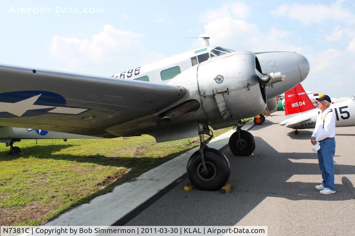 N7381C, 1944 Beech C18S C/N 8104, A former AAF crewman reminiscing. On display at Sun N Fun 2011 - Lakeland, FL