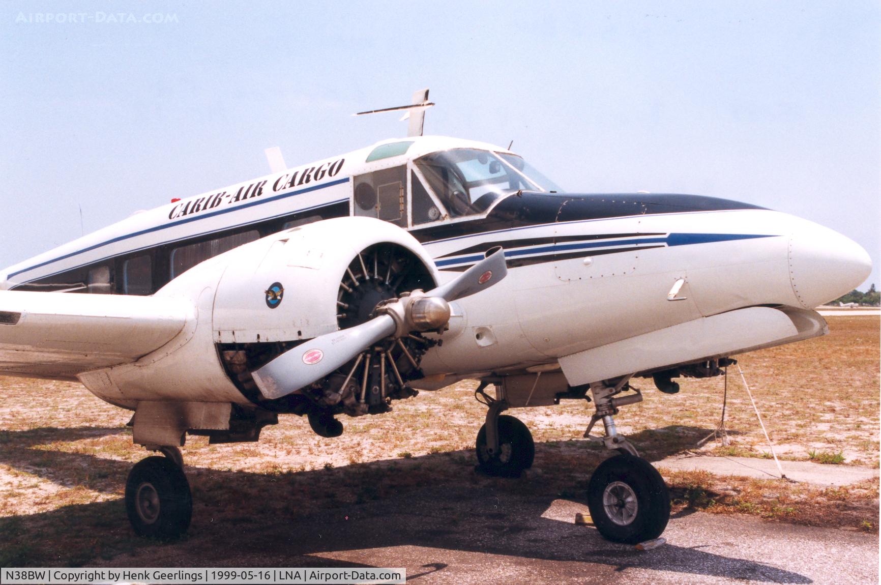 N38BW, 1965 Beech H-18 Tri-Gear C/N BA-725, Carib- Air Cargo ; bended prop