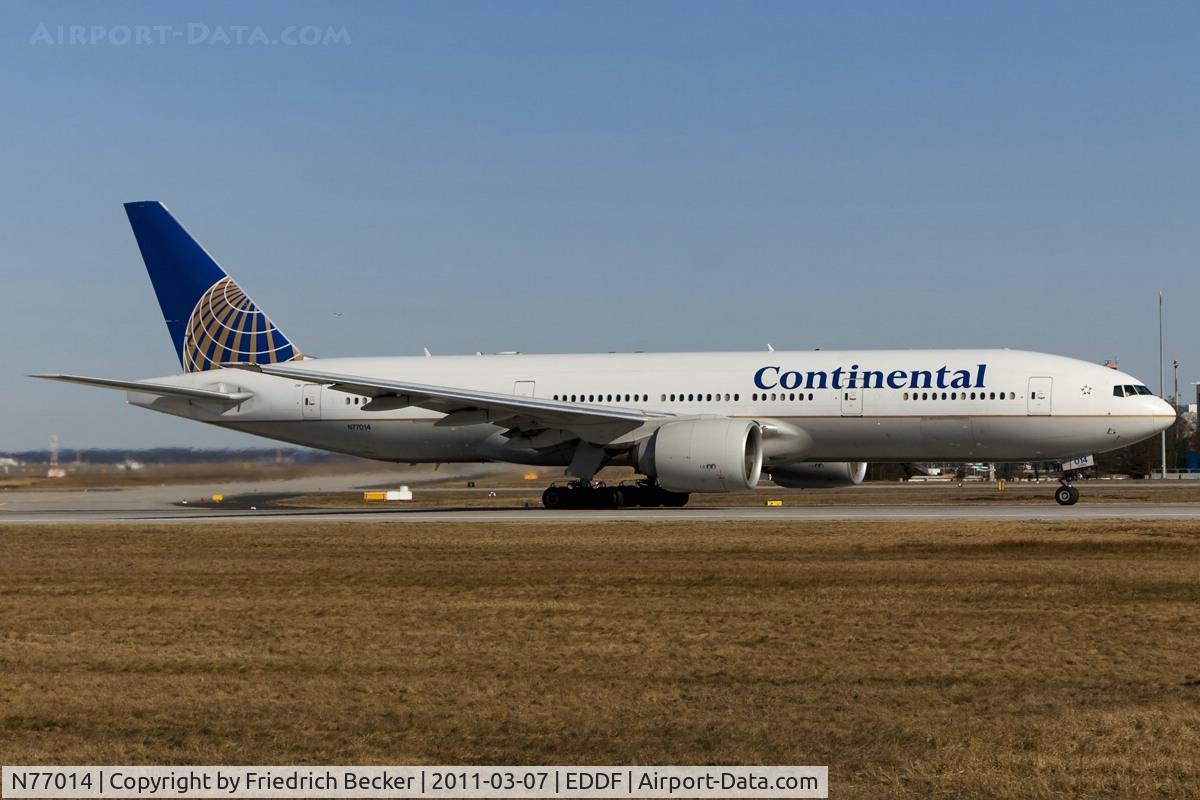 N77014, 1999 Boeing 777-224 C/N 29862, departure via RW18W