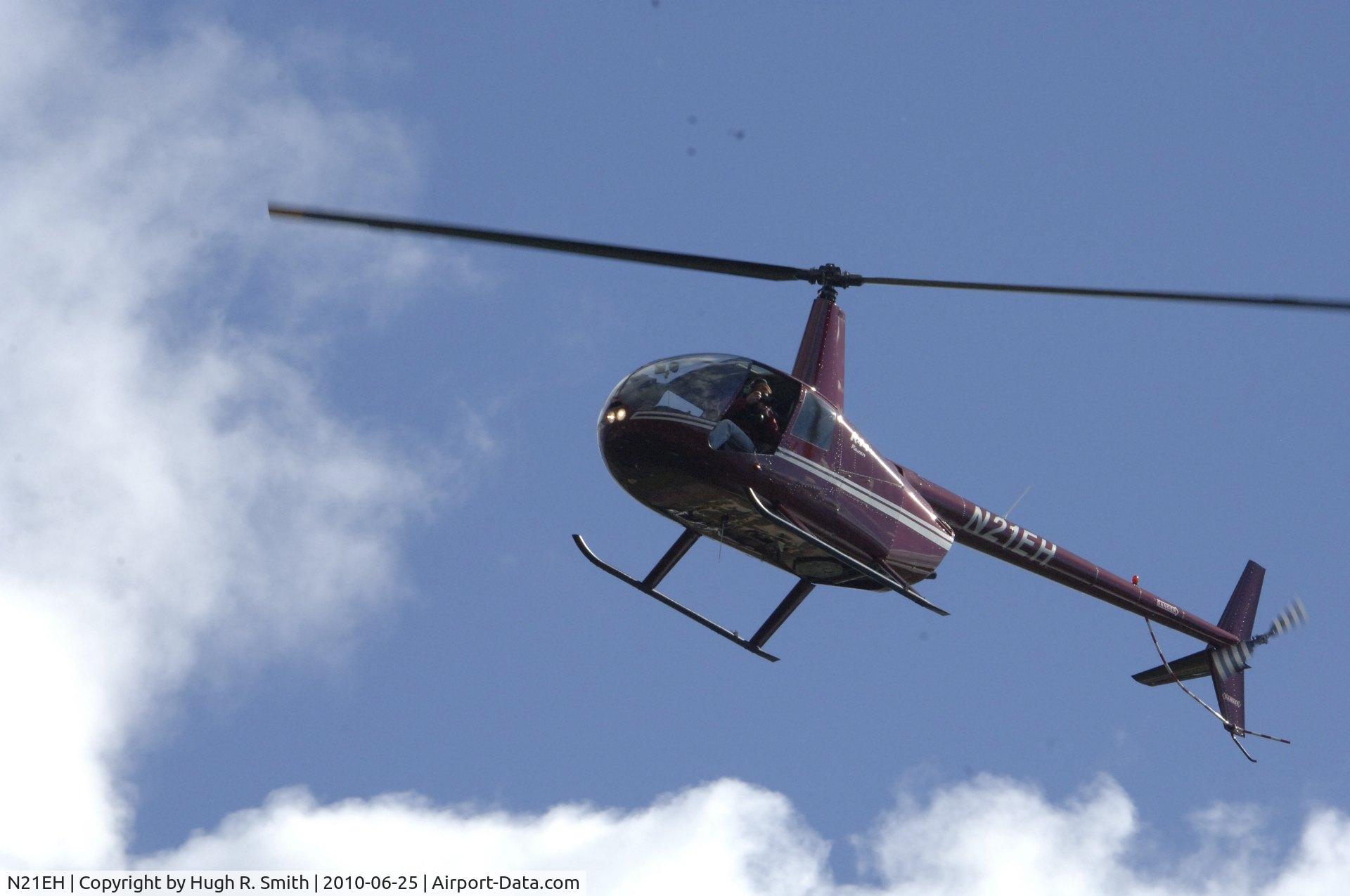 N21EH, 2000 Robinson R44 C/N 0881, Robie was hovering over my deck, doors off, getting shots of Southport Harbor, and me. I reciprocated with my Nikon 300D and a big, fast zoom lens. Who was that aerial photographer?