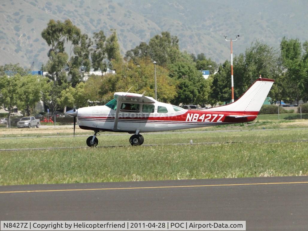 N8427Z, 1963 Cessna 210-5(205) C/N 205-0427, Rolling out after landing on runway 26L