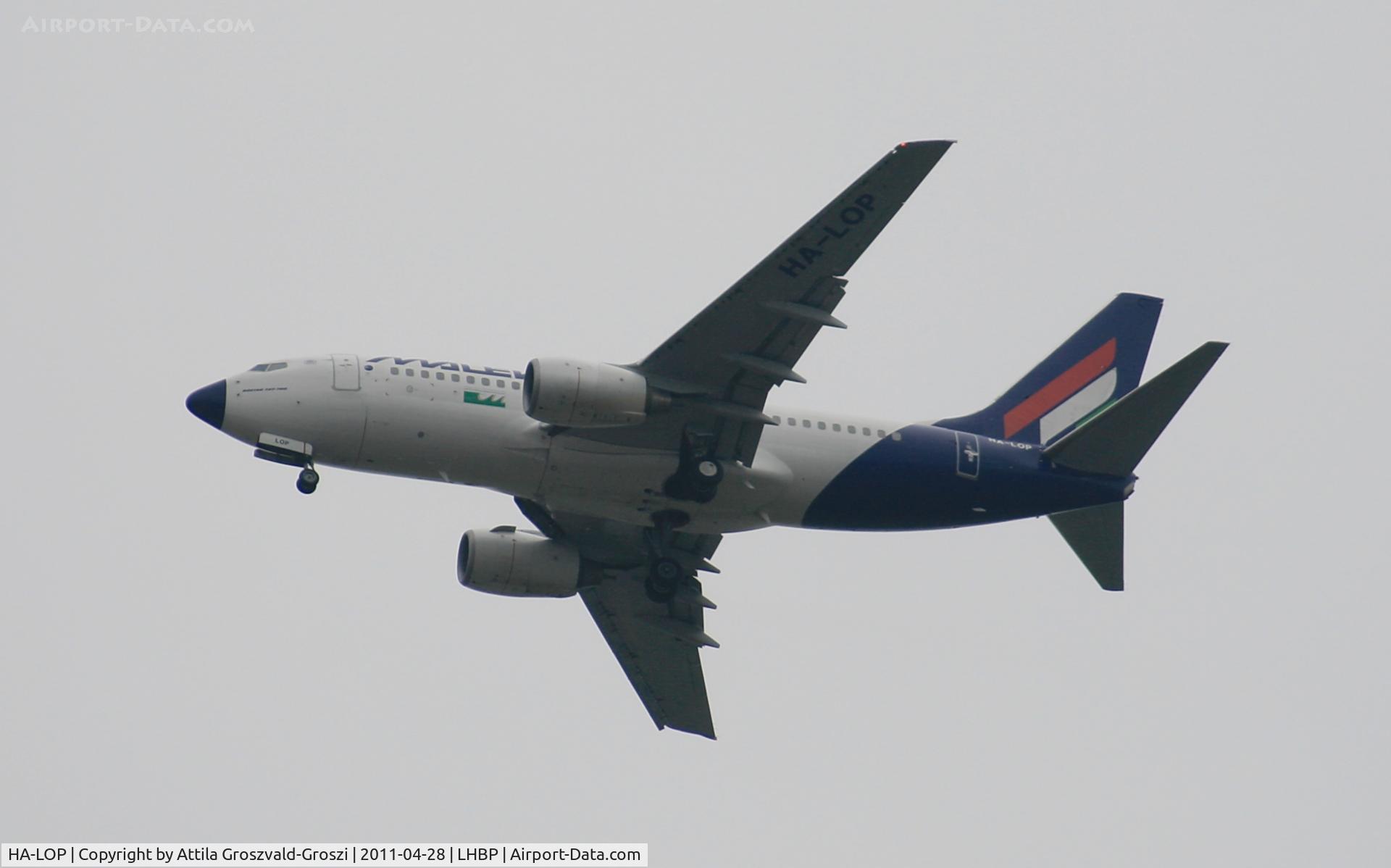 HA-LOP, 2004 Boeing 737-7Q8 C/N 29354, Getting off direction Budapest Ferihegy onto an International Airport, in Üllö city airspace.