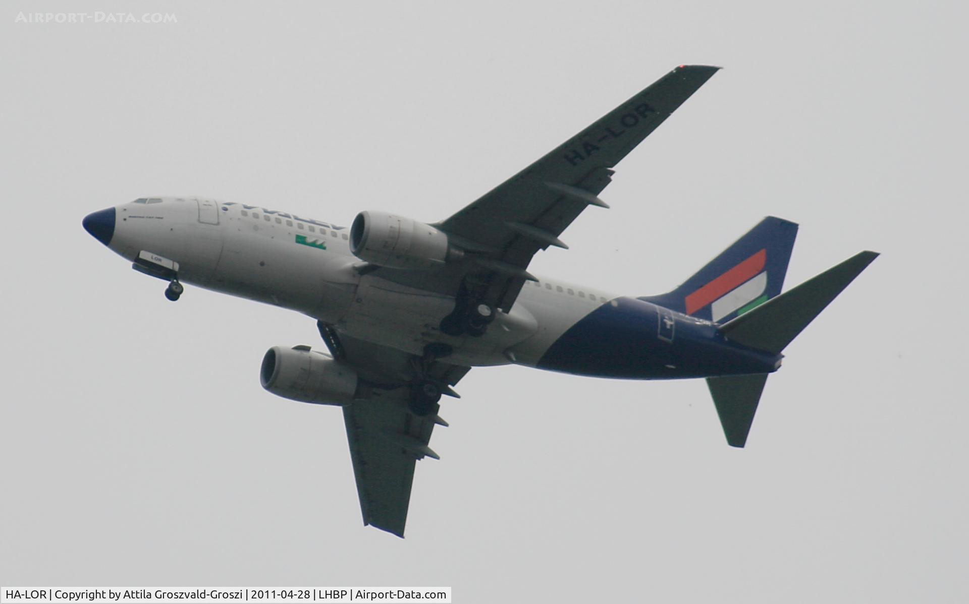 HA-LOR, 2004 Boeing 737-7Q8 C/N 29355, Getting off direction Budapest Ferihegy onto an International Airport, in Üllö city airspace.
