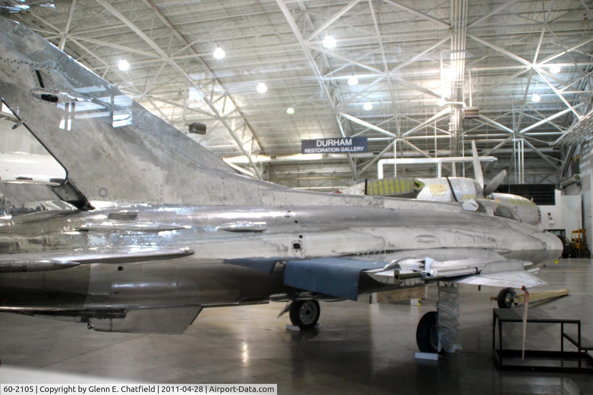 60-2105, Mikoyan-Gurevich MiG-21F-13 C/N Not found 21067, In the restoration shop at the Strategic Air & Space Museum, Ashland, NE.  Seen from cafe window