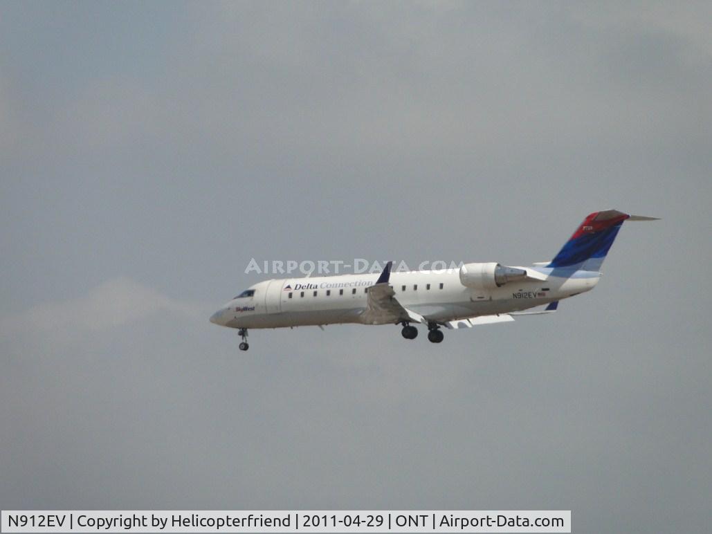 N912EV, 2002 Bombardier CRJ-200LR (CL-600-2B19) C/N 7728, SkyWest Delta Connection on final to 26R