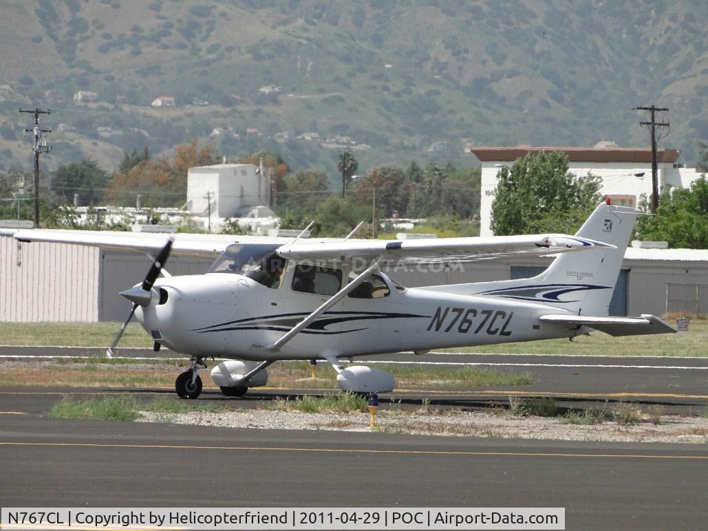 N767CL, 2005 Cessna 172S C/N 172S9987, Stopped on a taxiwat awaiting permission from ground control to enter taxiwat Sierra