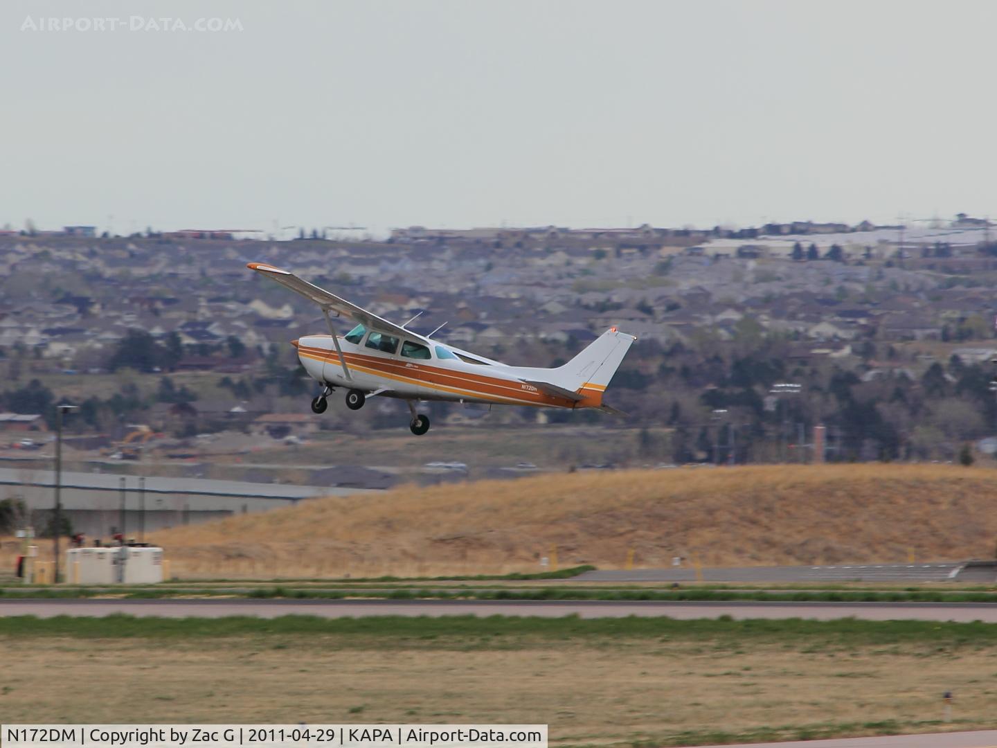 N172DM, 1978 Cessna 172N C/N 17270835, Taking off on 35R. This one appeared to get slammed to the ground by the wind shortly before I took this shot.
