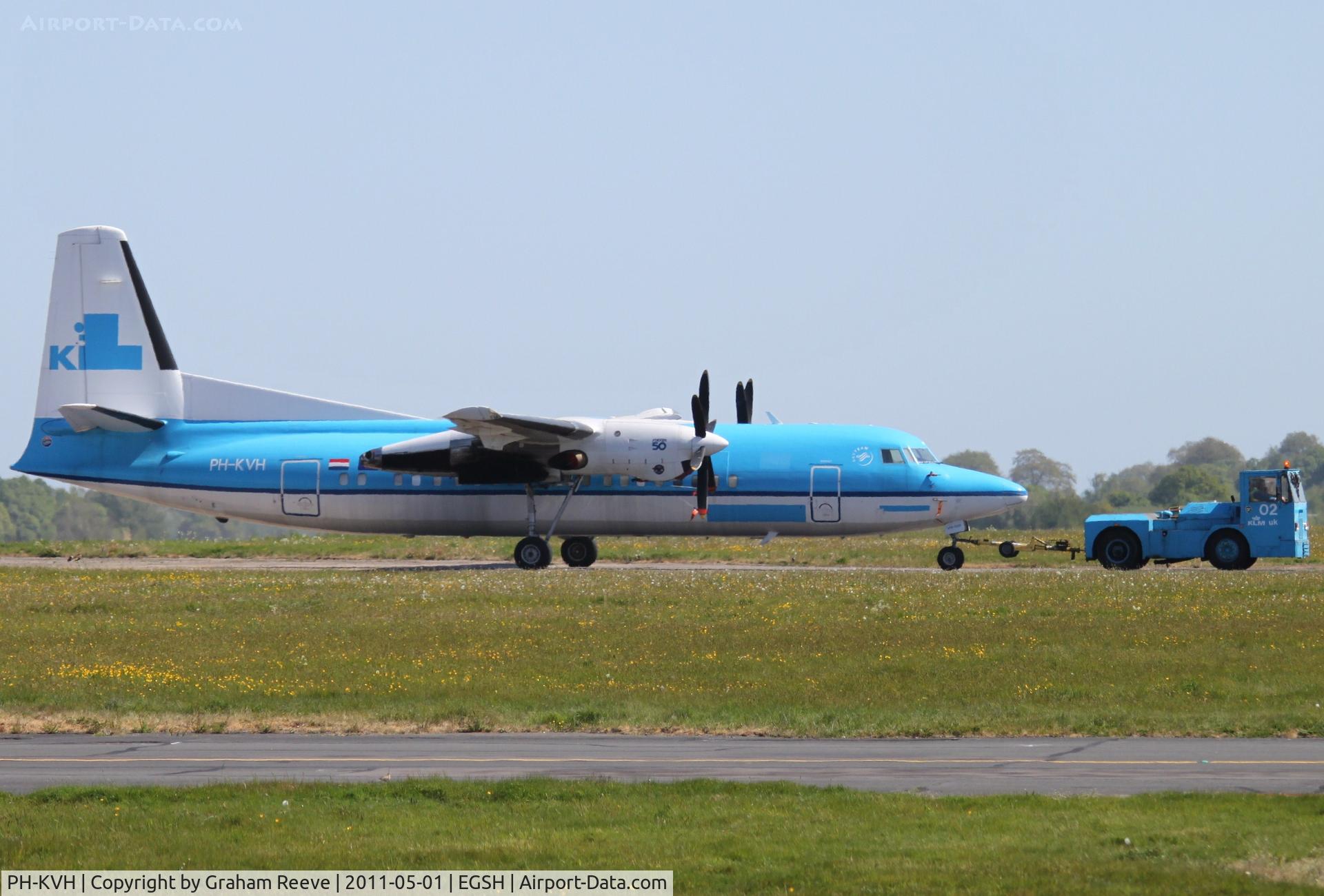 PH-KVH, 1991 Fokker 50 C/N 20217, Being towed across the airfield.