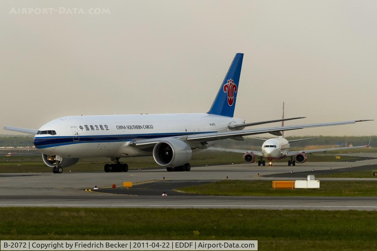 B-2072, 2009 Boeing 777-F1B C/N 37310, taxying to the active on a early morning departure