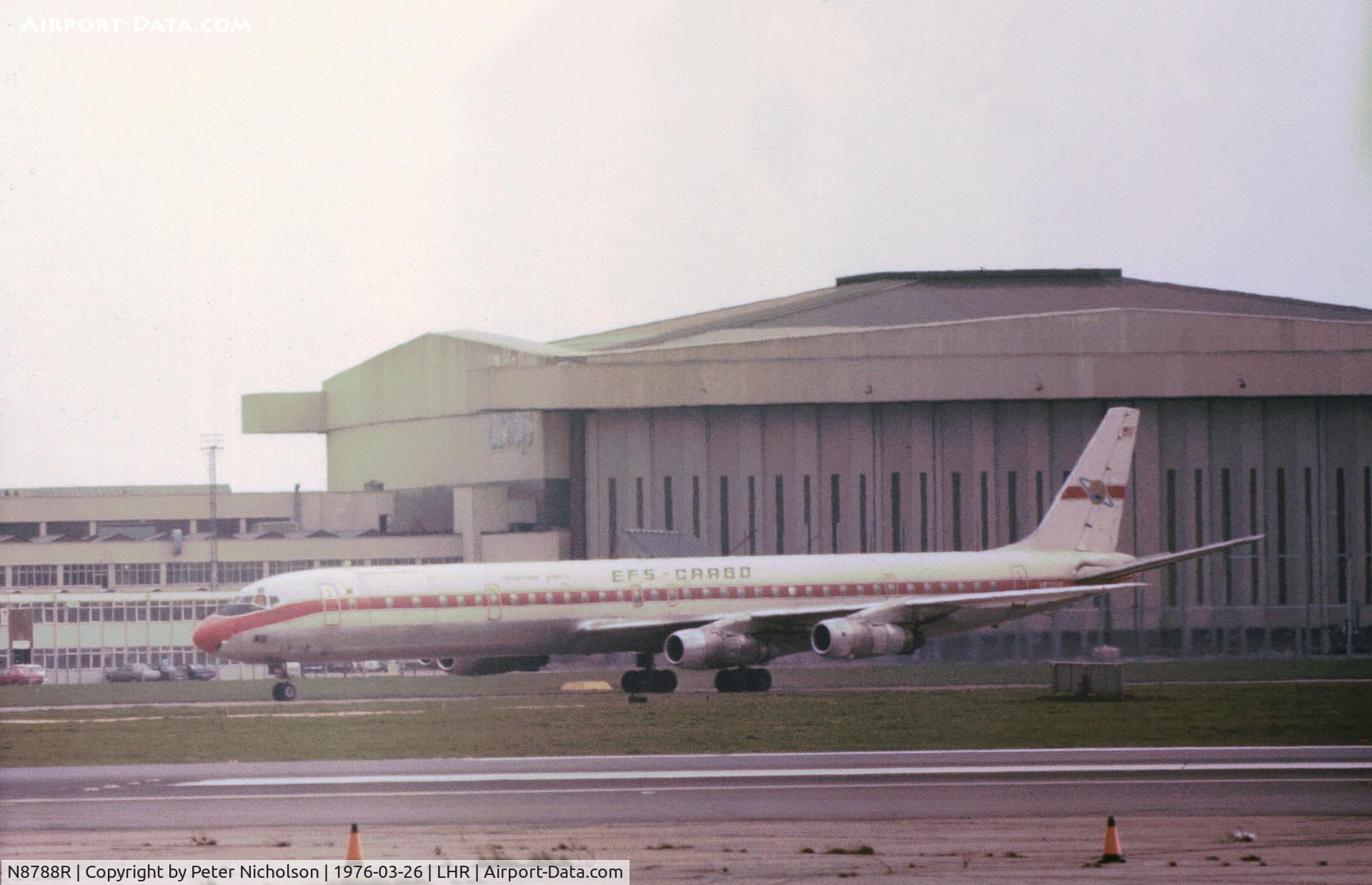 N8788R, 1968 Douglas DC-8-61CF C/N 45952, DC-8-61CF of Saturn Airways on lease to Seaboard World for EFS Cargo seen at Heathrow in March 1976.