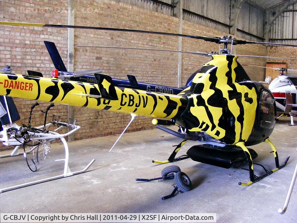 G-CBJV, 2001 Rotorway Exec 162F C/N 6589, At Rotorway UK, Street Farm, Takeley. This was built by Mark Evans on the TV programme 