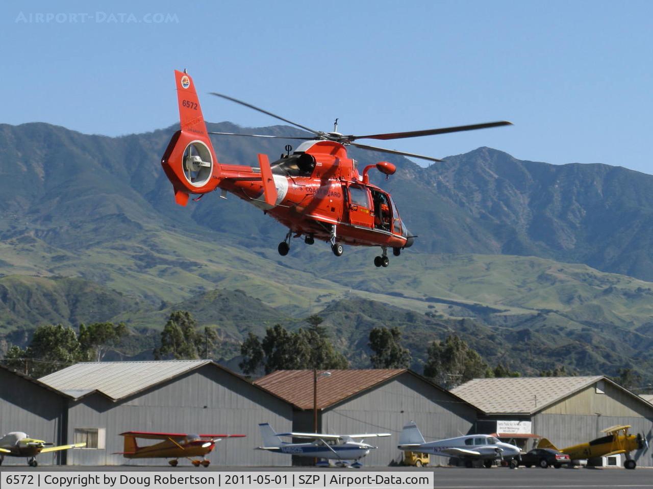 6572, Aerospatiale HH-65C Dolphin C/N 6267, Aerospatiale MH-65C DOLPHIN of USCG, two Turbomeca Arriel 2C-CG Turboshaft engines, 934 shp each. 10 blade (count 'em!) distinctive Fenestron tail rotor, seldom seen sight-low pass over Rwy 04