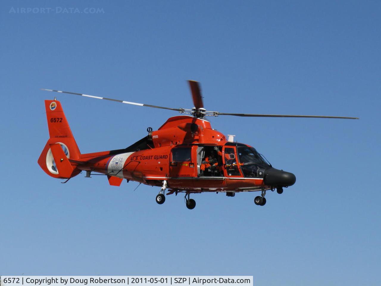 6572, Aerospatiale HH-65C Dolphin C/N 6267, Aerospatiale MH-65C DOLPHIN of USCG, two Turbomeca Arriel 2C-CG Turboshaft engines 934 shp each, seldom seen sight-low pass over Rwy 04 with a big wave to photographer-Thanks Guys!