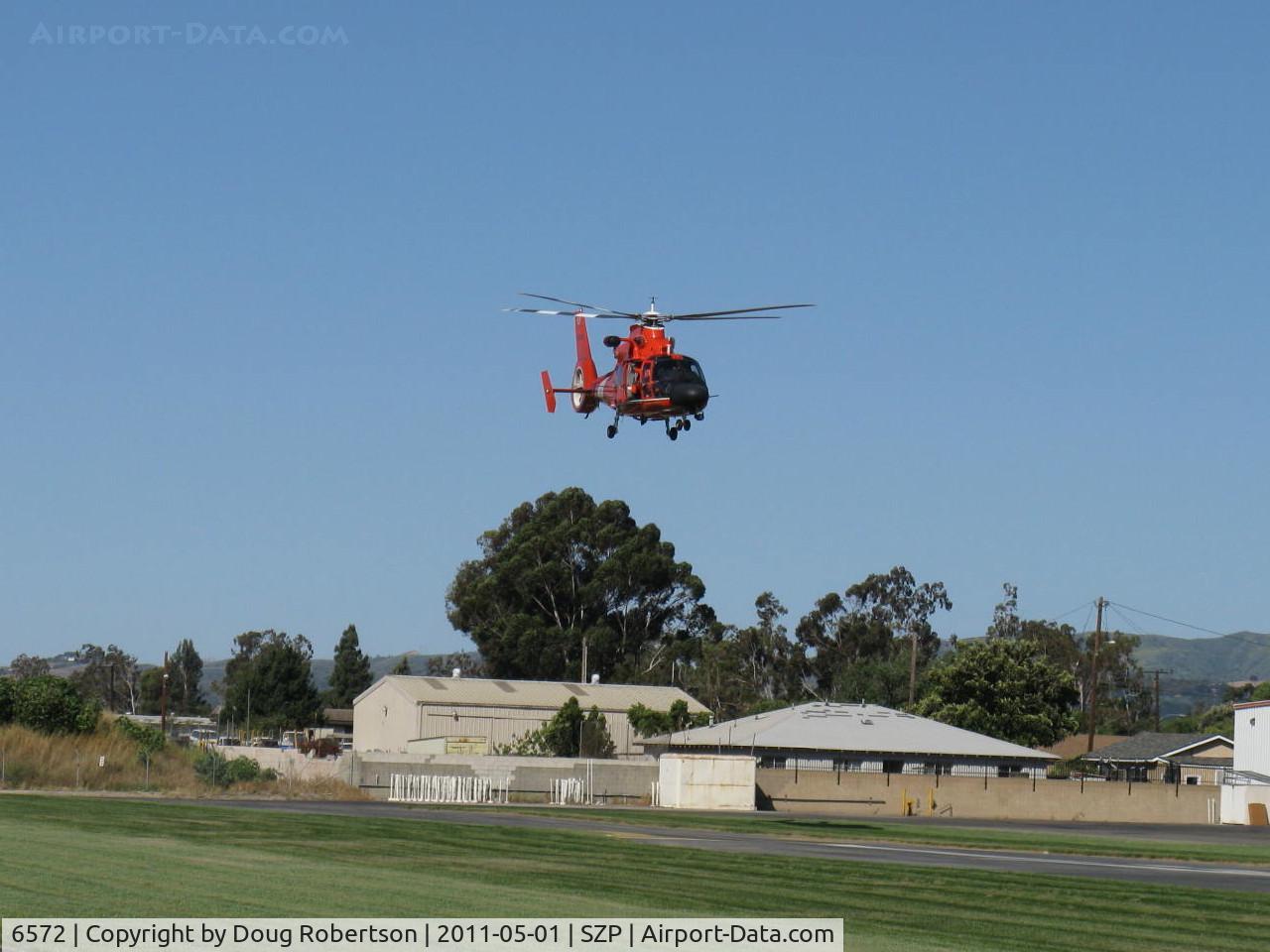 6572, Aerospatiale HH-65C Dolphin C/N 6267, Aerospatiale MH-65C DOLPHIN of USCG, two Turbomeca Arriel 2C-CG Turboshafts 934 shp each, distinctive Fenestron tail rotor, seldom seen sight-low pass over Rwy 04