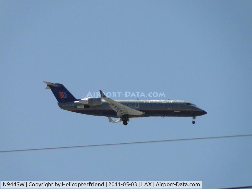 N944SW, 2003 Bombardier CRJ-200LR (CL-600-2B19) C/N 7764, Sky West, United Express, 1/2 miles east of LAX on final to runway 24