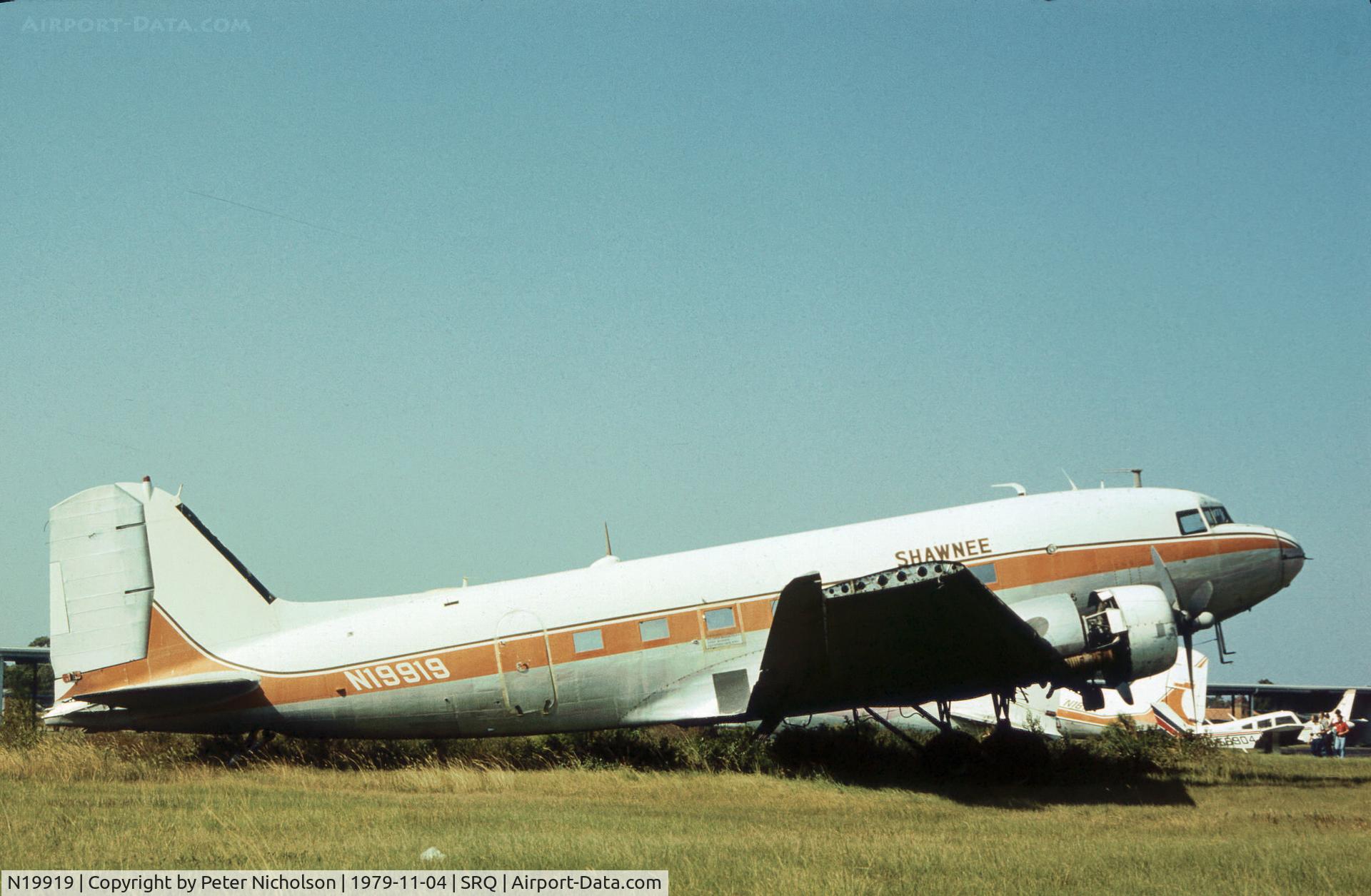 N19919, 1942 Douglas DC3A C/N 4869, C-53A ex 41-20009 of Shawnee Air Lines withdrawn from use at Sarasota in November 1979.
