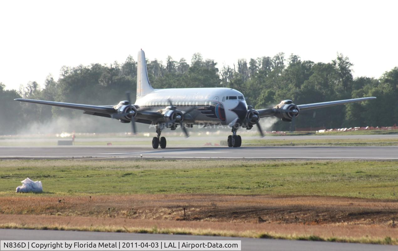 N836D, 1957 Douglas DC-7B C/N 45345, Trailing some smoke on take off