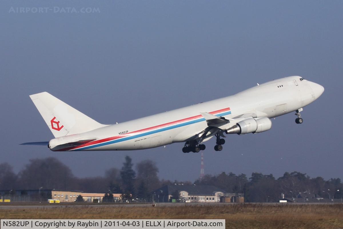 N582UP, 1997 Boeing 747-4R7F/SCD C/N 29053, The very 1st flight with the new reg. Former Cargolux LX-LCV leaving LUX for the last time in basic Cargolux c/s for his new owner UPS.