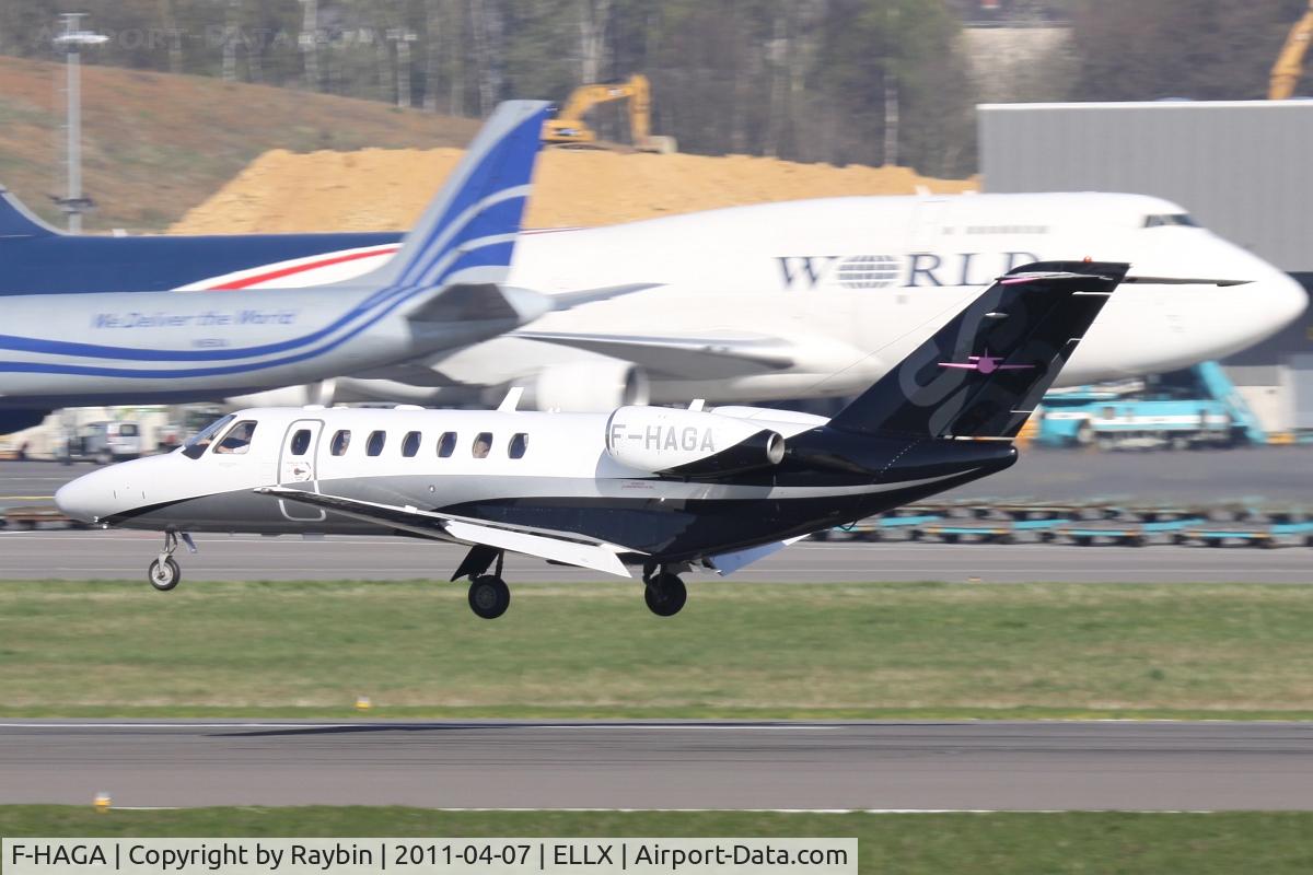 F-HAGA, 2008 Cessna 525B CitationJet Cj3 C/N 525B-0258, In the background the National DC-8 N155CA and the World 747 N741WA