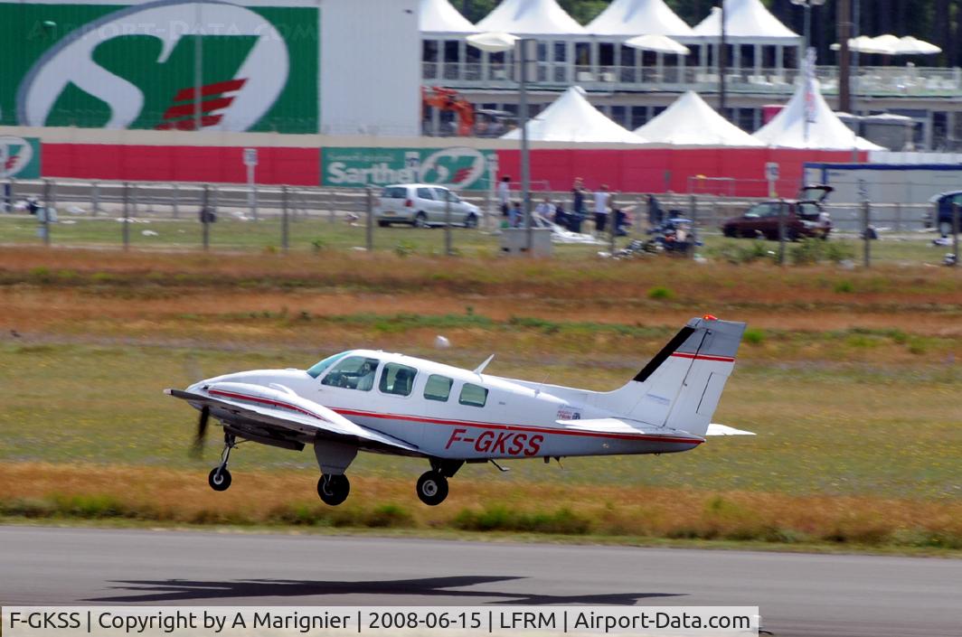 F-GKSS, 1971 Beech 58 Baron C/N TH-154, Take-off RW02 - background: famous Le Mans 24Hour track just after the end of the 2008 edition of the legendary car race.