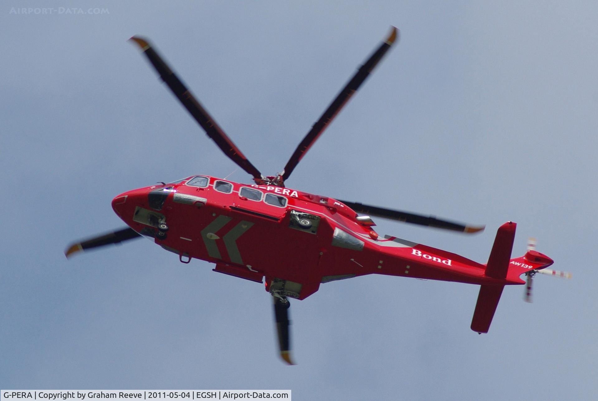 G-PERA, 2010 AgustaWestland AW-139 C/N 31322, Passing over head.
