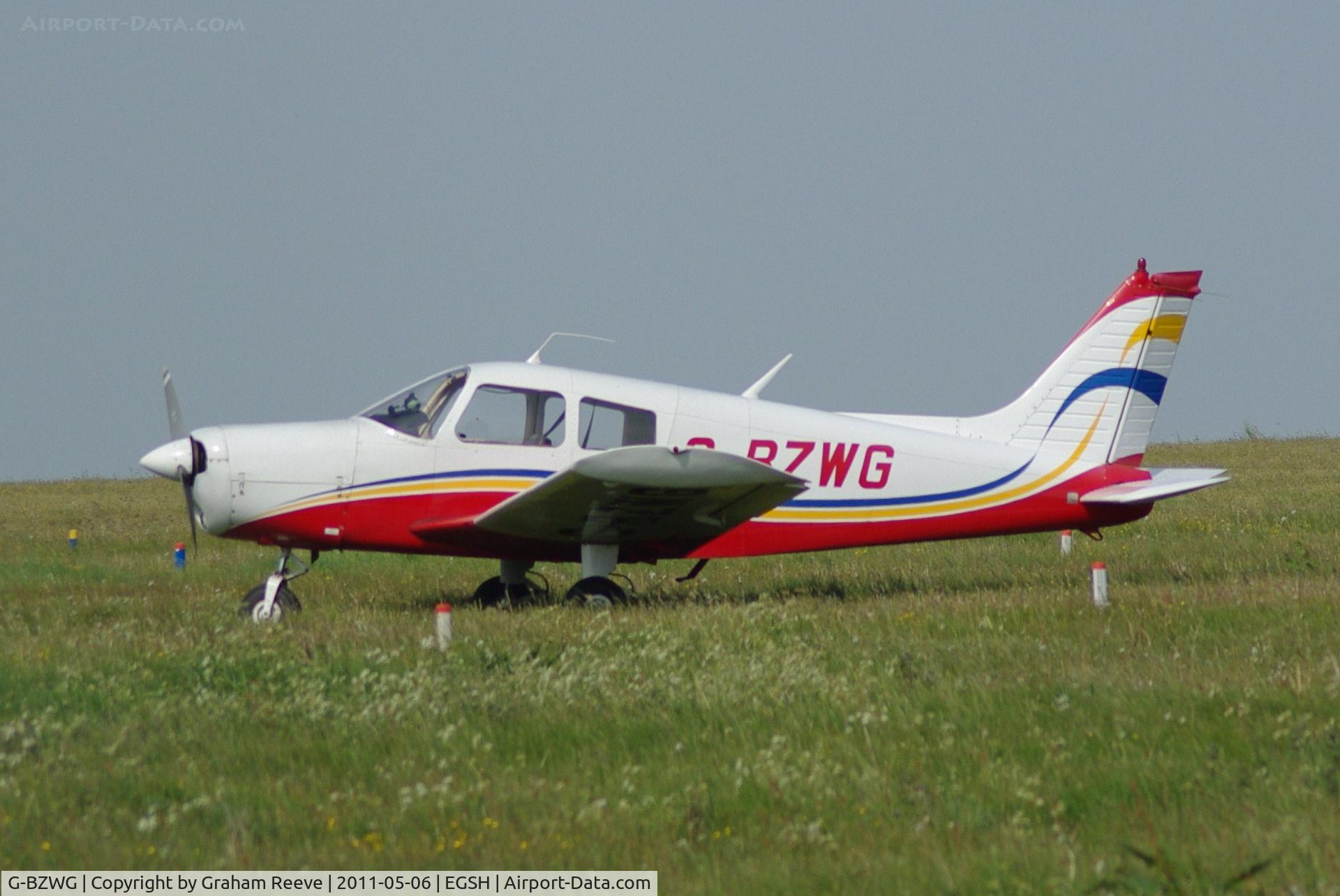 G-BZWG, 1976 Piper PA-28-140 Cherokee Cruiser C/N 28-7625188, Parked in the sun.