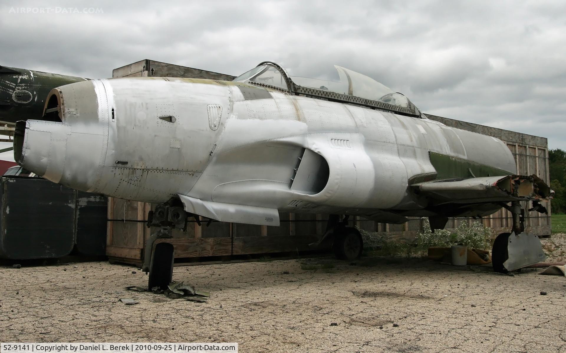 52-9141, 1952 Lockheed T-33A Shooting Star C/N 580-7195, The forward section on display at the Russell Military Museum; the aft section and the GE J47 powerplant are located nearby.