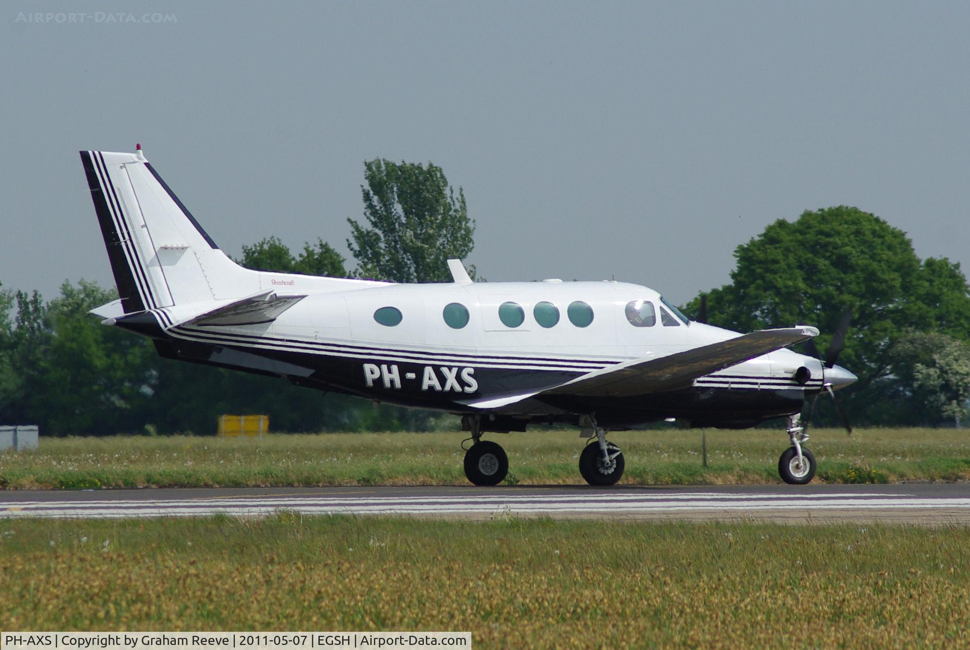 PH-AXS, 1978 Beech E90 King Air C/N LW-297, About to take off.