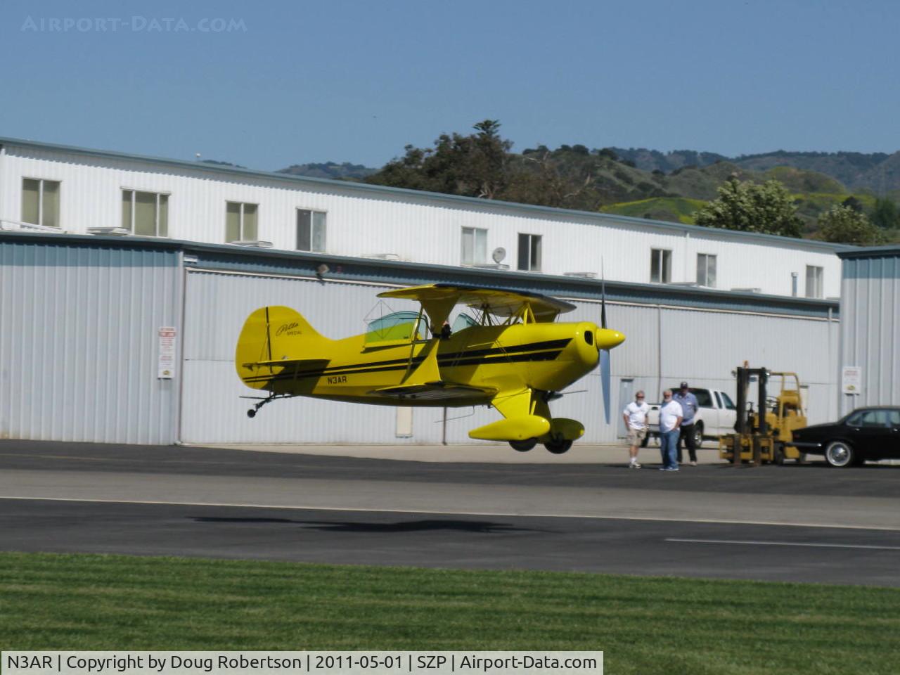 N3AR, 1974 Pitts S-1S Special C/N 10, 1974 Russell PITTS SPECIAL S-1S, Lycoming O&VO-360 180 Hp, on final Rwy 04 with landing critique gang in background