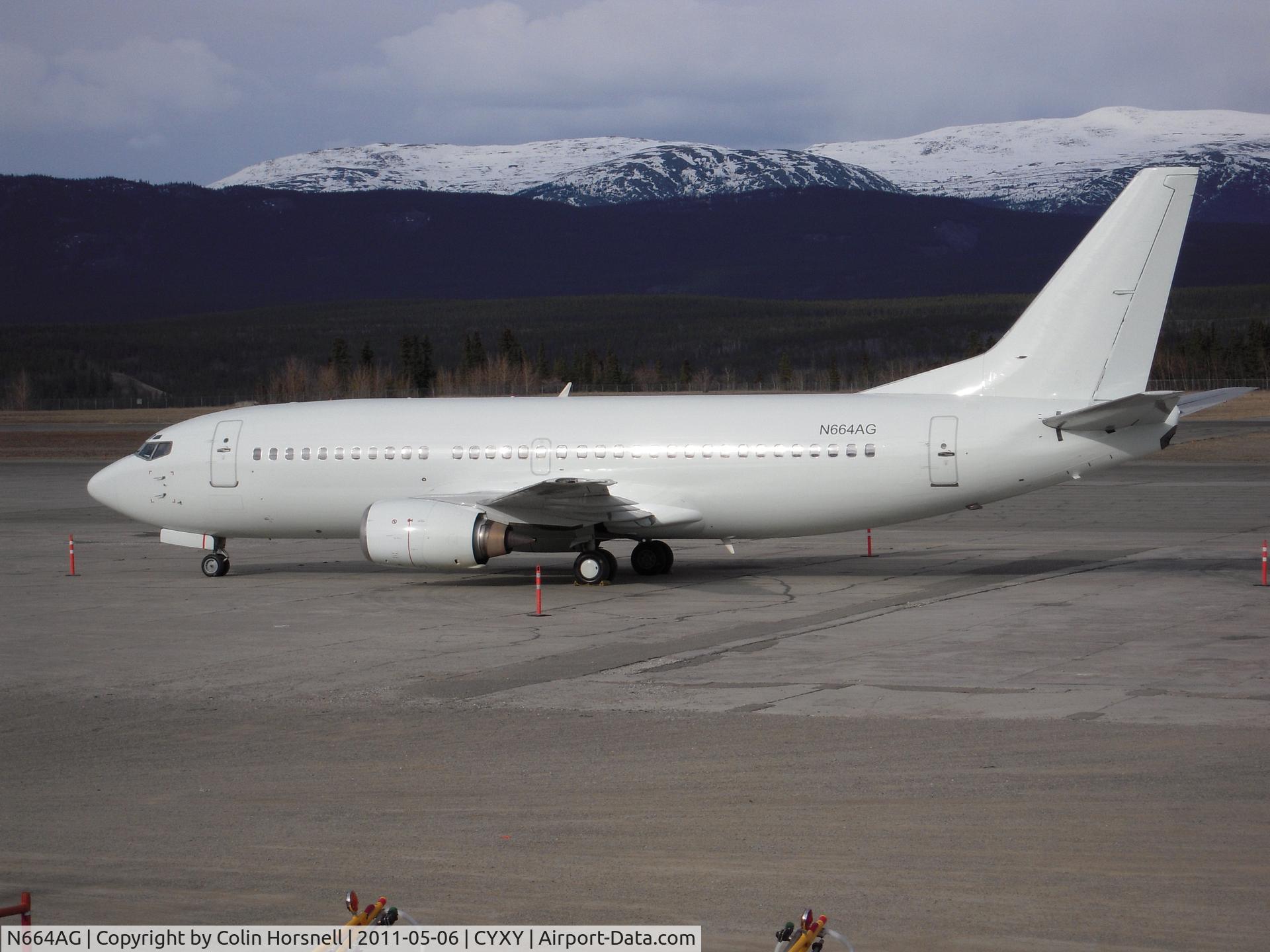 N664AG, 1997 Boeing 737-36Q C/N 28664, unmarked 737 spent the night @ YXY Whitehorse Int. Airport. Yukon Canada