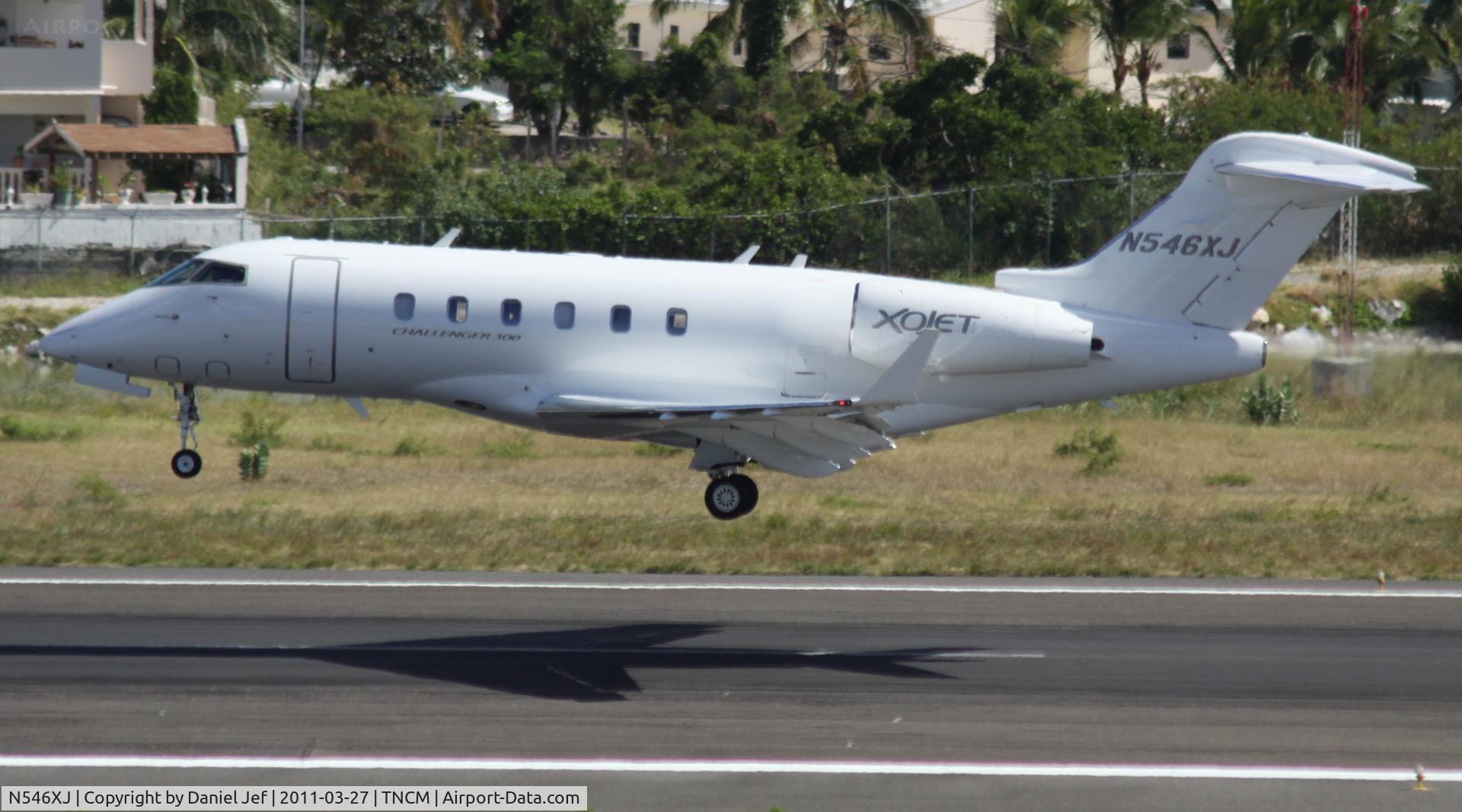N546XJ, 2009 Bombardier Challenger 300 (BD-100-1A10) C/N 20280, N546XJ landing at TNCM