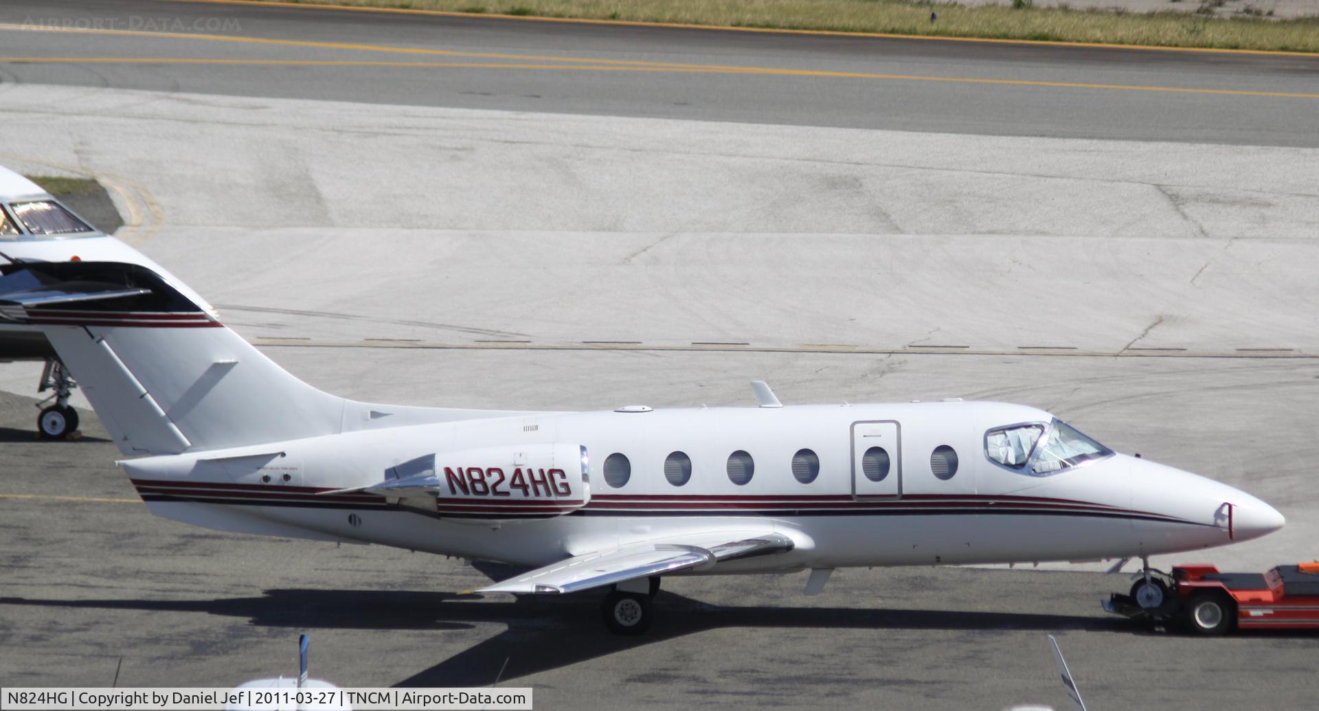 N824HG, 1997 Beech 400A Beechjet C/N RK-143, N824HG being park at the cargo ramp at TNCM