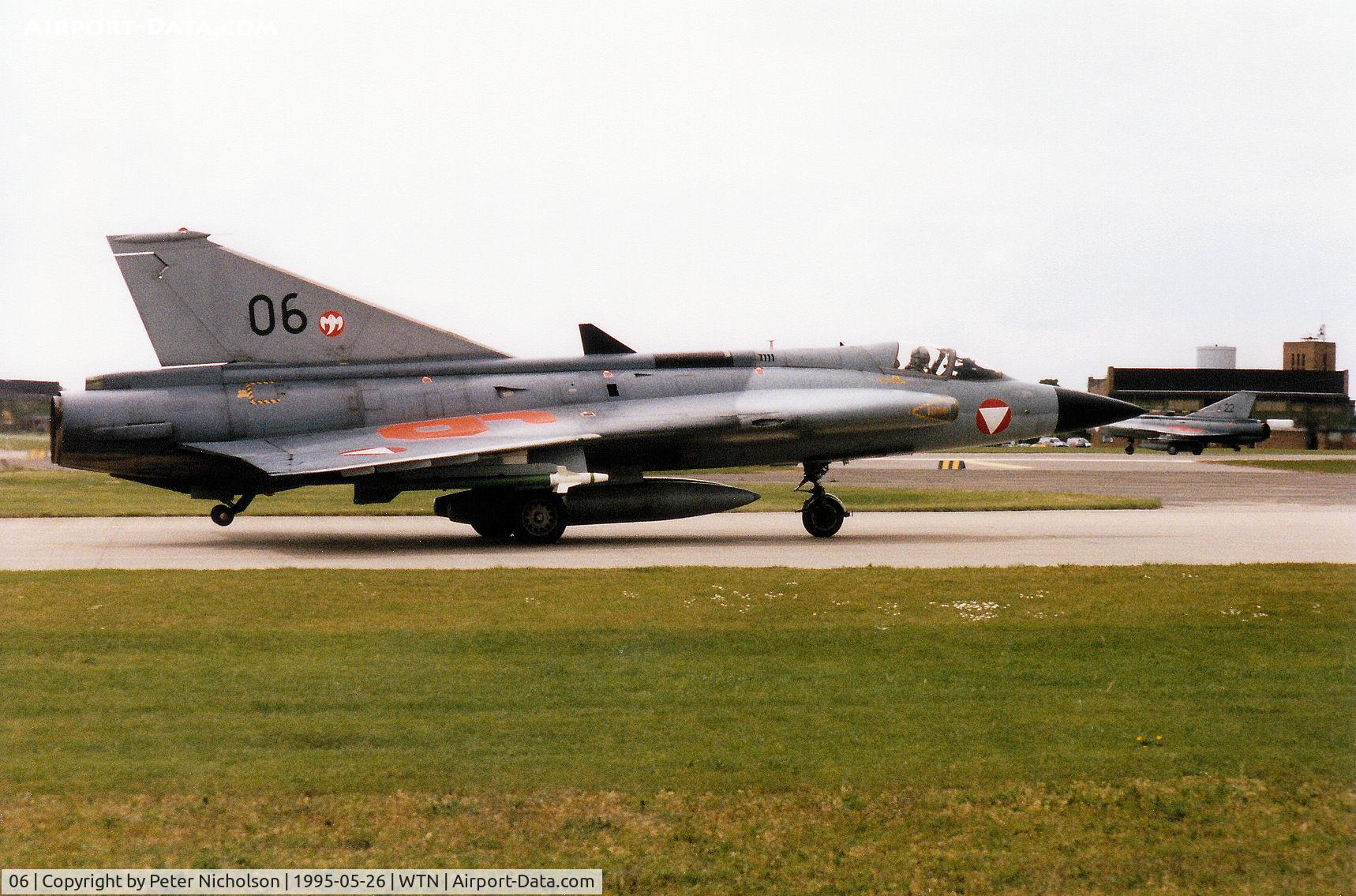06, Saab J-35Oe MkII Draken C/N 351406, Austrian Air Force Draken of 1 Staffel on detachment to RAF Waddington joining the active runway in May 1995.
