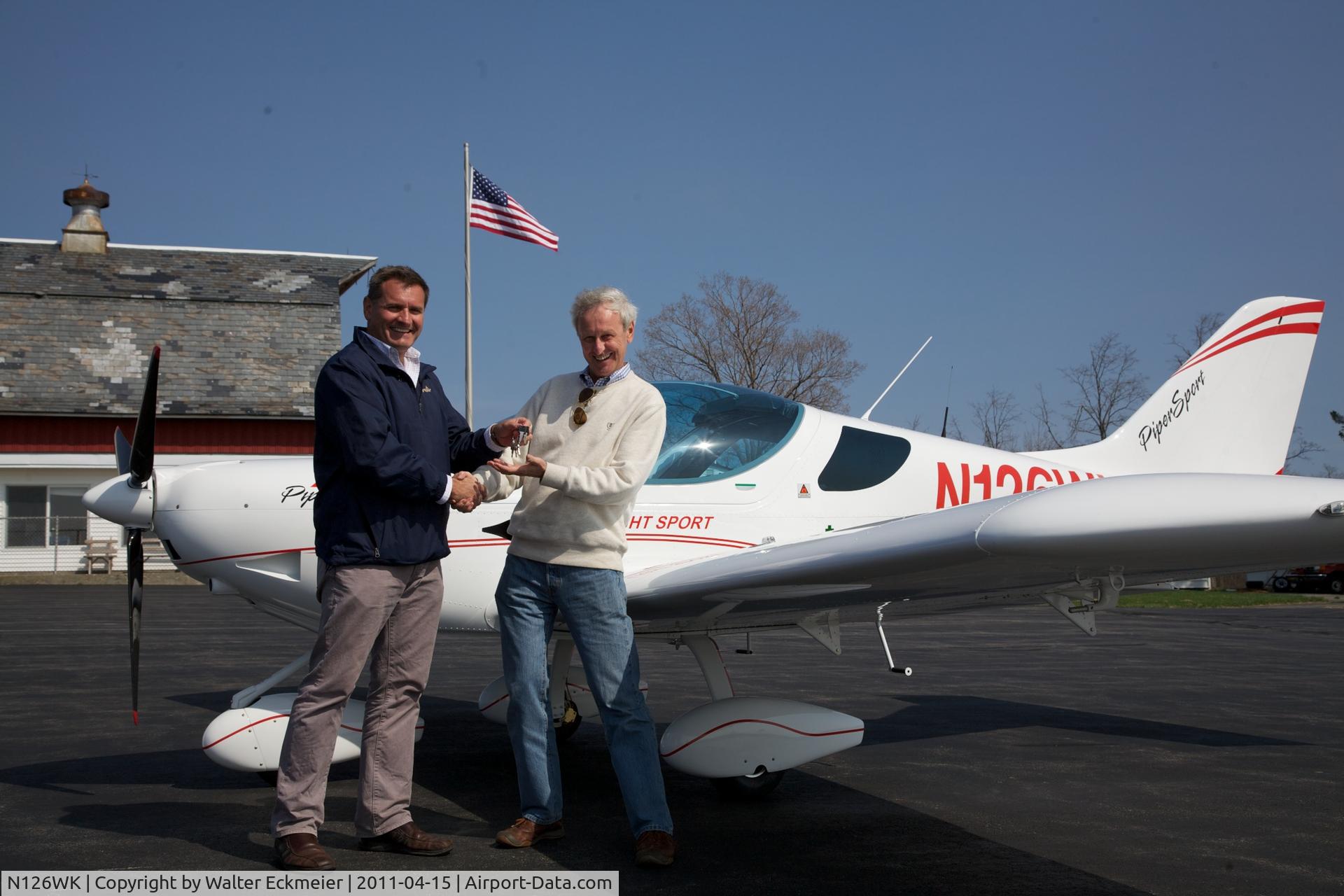N126WK, 2011 SportCruiser Piper Sport C/N P1001093, accepting the keys for N126WK from John Rathmall