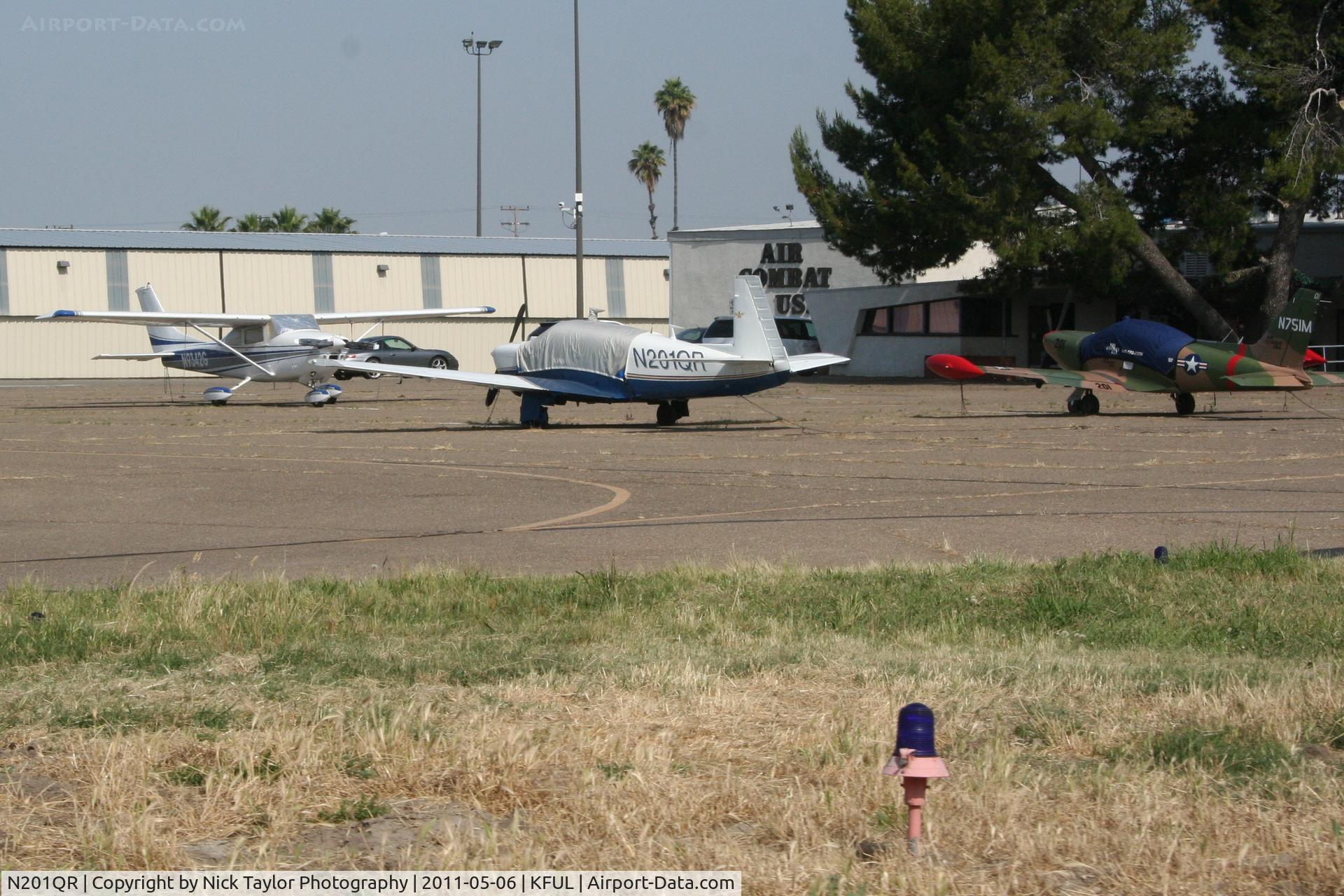 N201QR, 1977 Mooney M20J 201 C/N 24-0353, Sits with an Air Combat Inc. Marchetti Sf-260