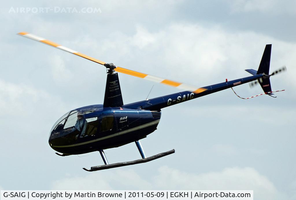 G-SAIG, 2006 Robinson R44 II C/N 11364, Long distance shot so res not so good!