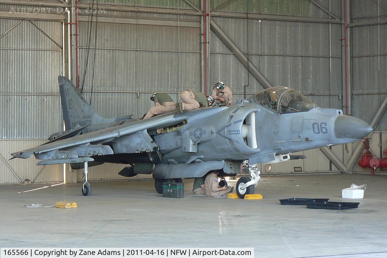 165566, Boeing AV-8B+(R)-27-MC Harrier II Plus C/N B303, At the 2011 Air Power Expo Airshow - NAS Fort Worth. Working to change the engine after an attempted vertical takeoff from an asphalt portion of the taxiway...yikes