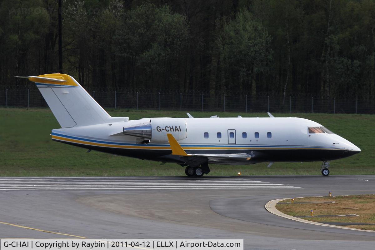 G-CHAI, 1994 Canadair Challenger 601-3A (CL-600-2B16) C/N 5152, Colorfull bizjet under a grey sky