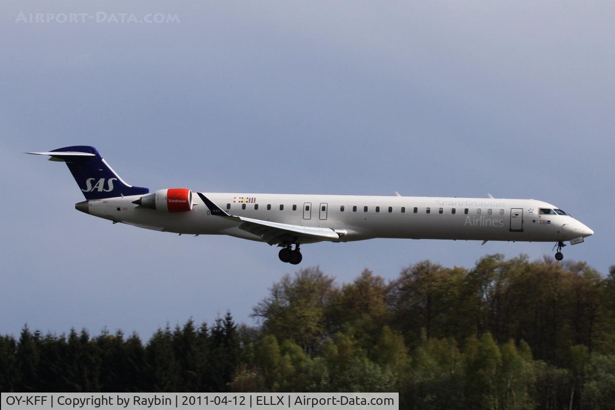 OY-KFF, 2009 Bombardier CRJ-900 (CL-600-2D24) C/N 15231, Between 2 heavy rainshowers