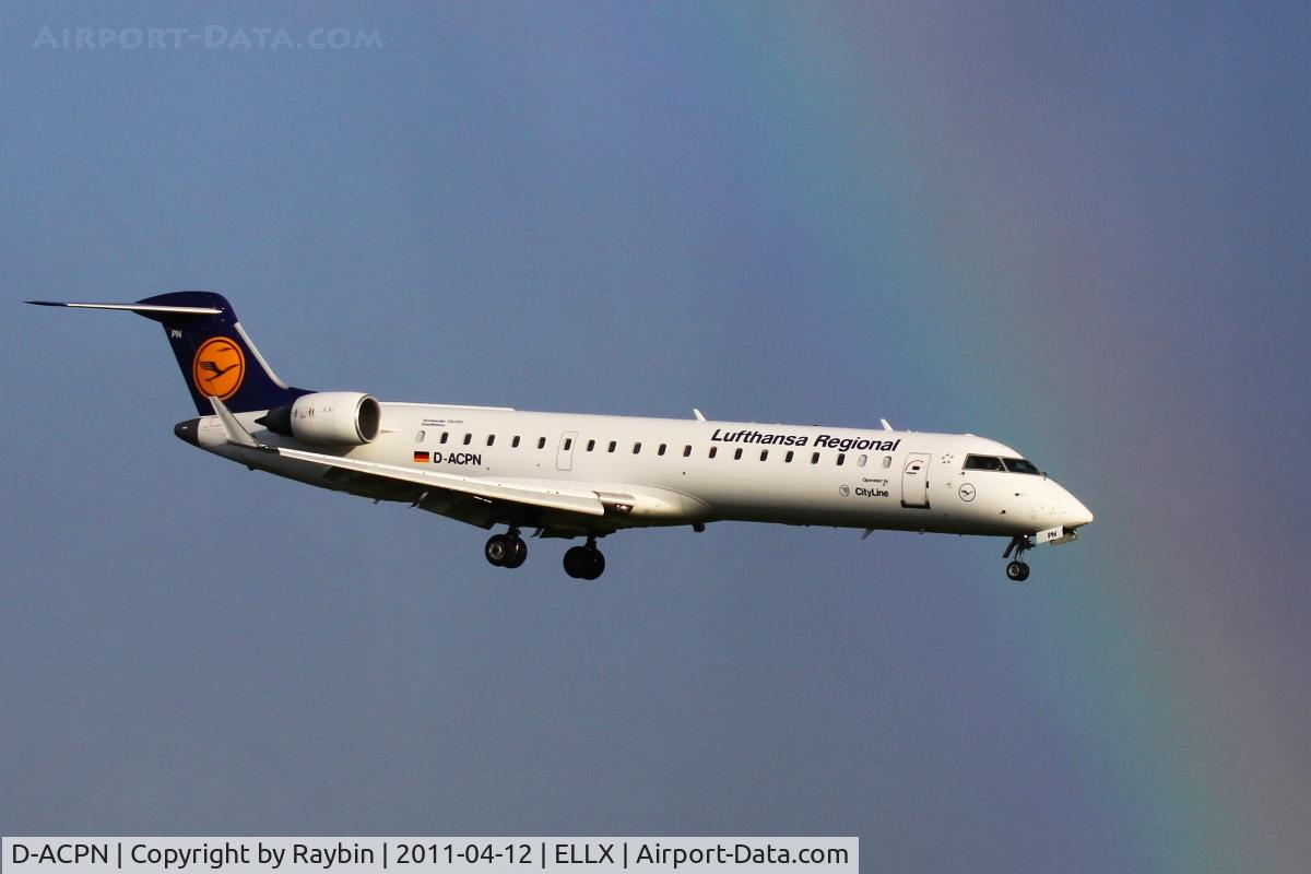 D-ACPN, 2003 Bombardier CRJ-701ER (CL-600-2C10) Regional Jet C/N 10083, Not over but under the rainbow.