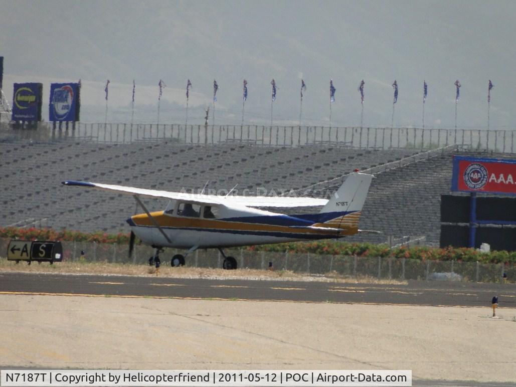 N7187T, 1959 Cessna 172A C/N 46787, Holding short of runway 26L for landing aircraft