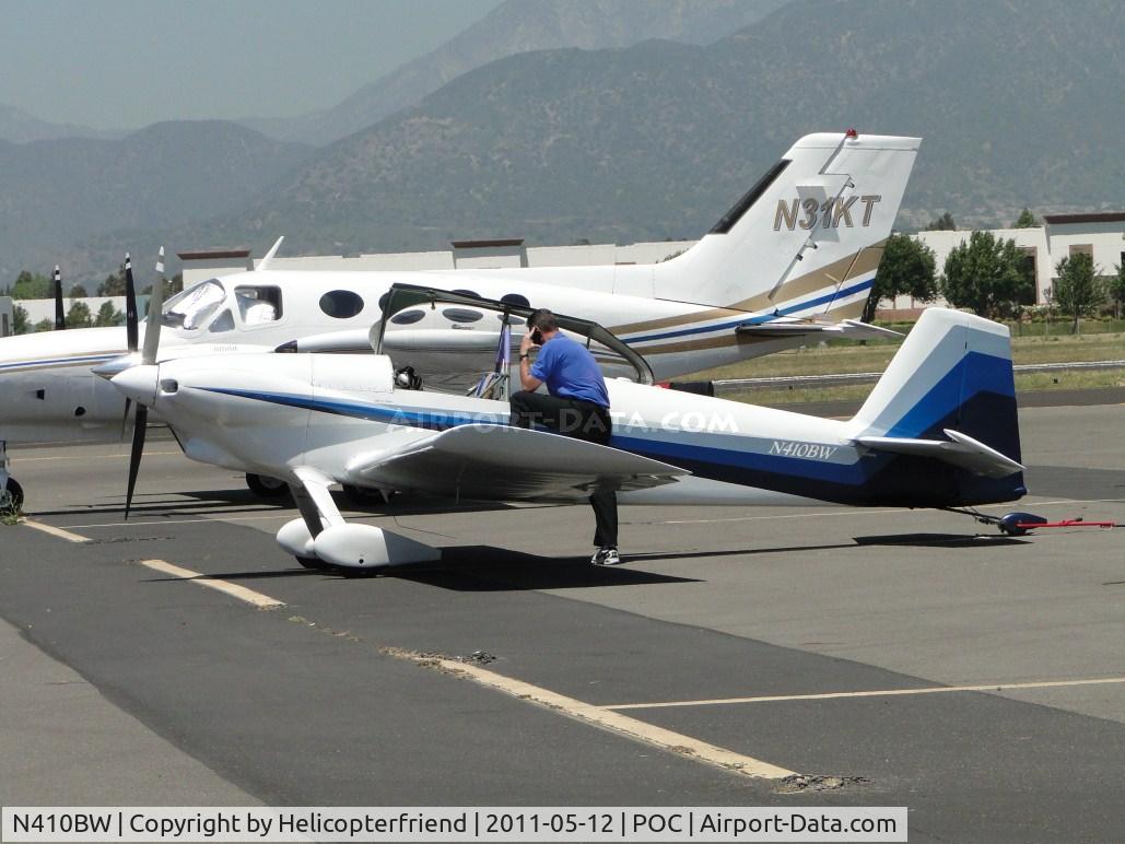 N410BW, 1964 Vans RV-4 C/N 106, Just parked in transient parking area and on the cell phone