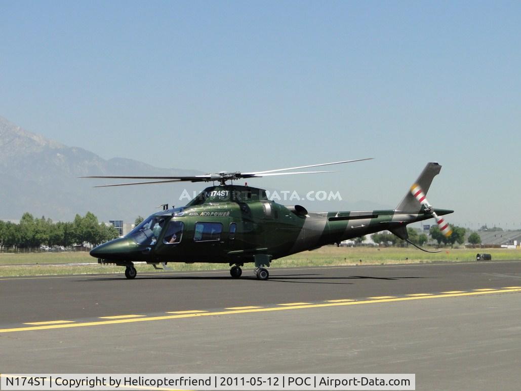 N174ST, 2001 Agusta A-109E Power C/N 11115, Taxiing onto taxiway Sierra for lift off westbound