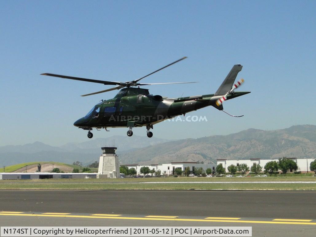 N174ST, 2001 Agusta A-109E Power C/N 11115, Lifting off westbound with two passengers