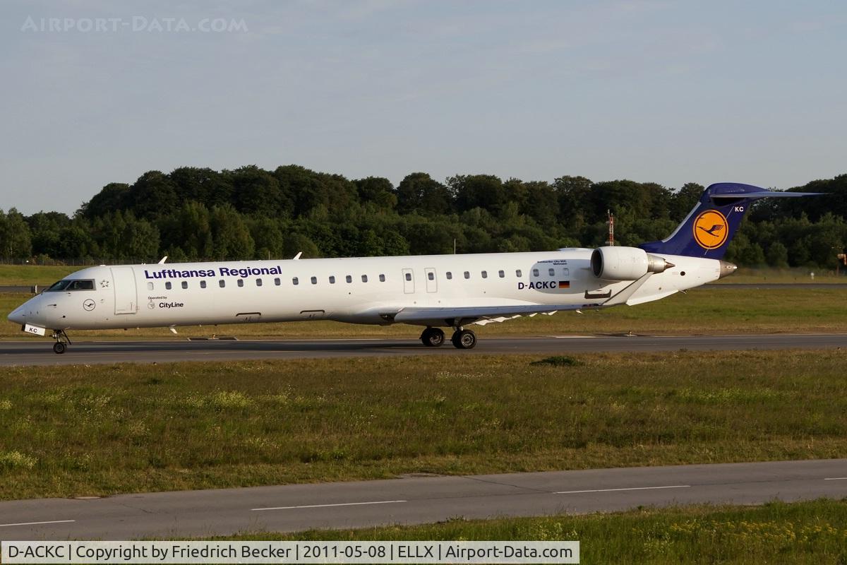 D-ACKC, 2006 Bombardier CRJ-900LR (CL-600-2D24) C/N 15078, taxying to the active
