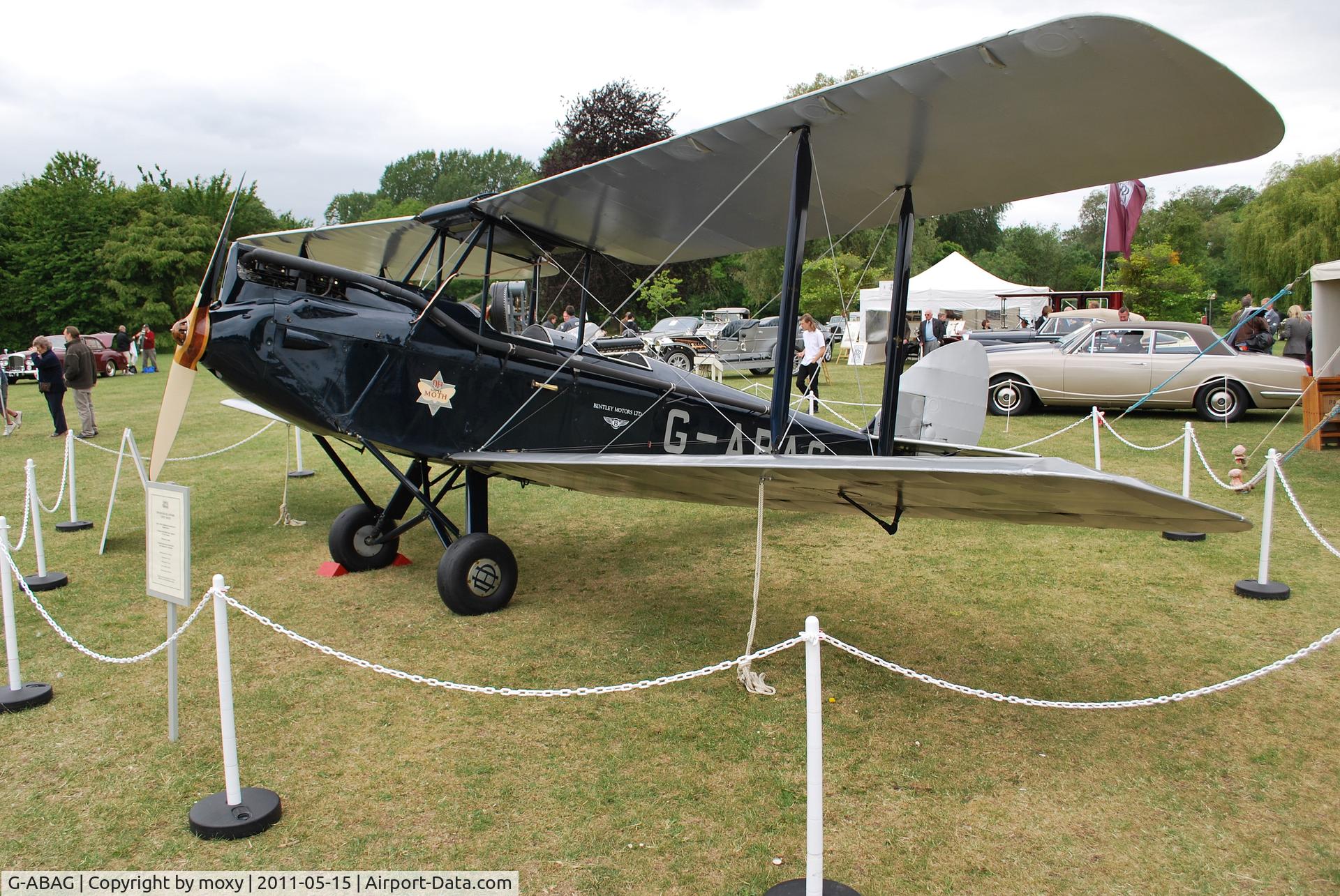G-ABAG, 1930 De Havilland DH60G Gipsy Moth C/N 1259, Gipsy Moth at a Rolls Royce and Bentley owners do at Runnymede. These were real Rollers and Bentleys, not the junk now produced by BMW and Volkswagen.